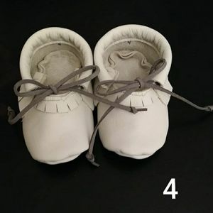 Cream baby moccasins